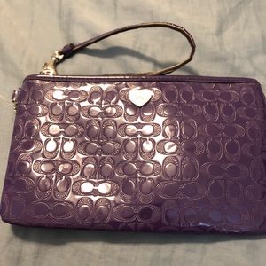 Purple coach wristlet